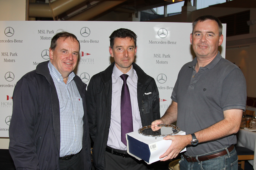 Stephen Harris and Chris Howard receive the Sleator Salver from Ronal McCaul