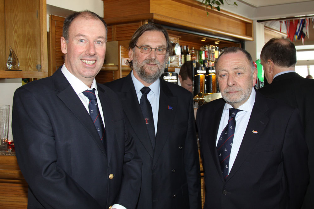 Brian Turvey with Negley Groom (Commodore Poolbeg Yacht and Boat Club) and HYC Rear Commodore Joe Carton
