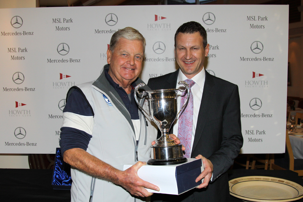 Pat Kelly (Storm) with the Evora Trophy and Dean Fullston