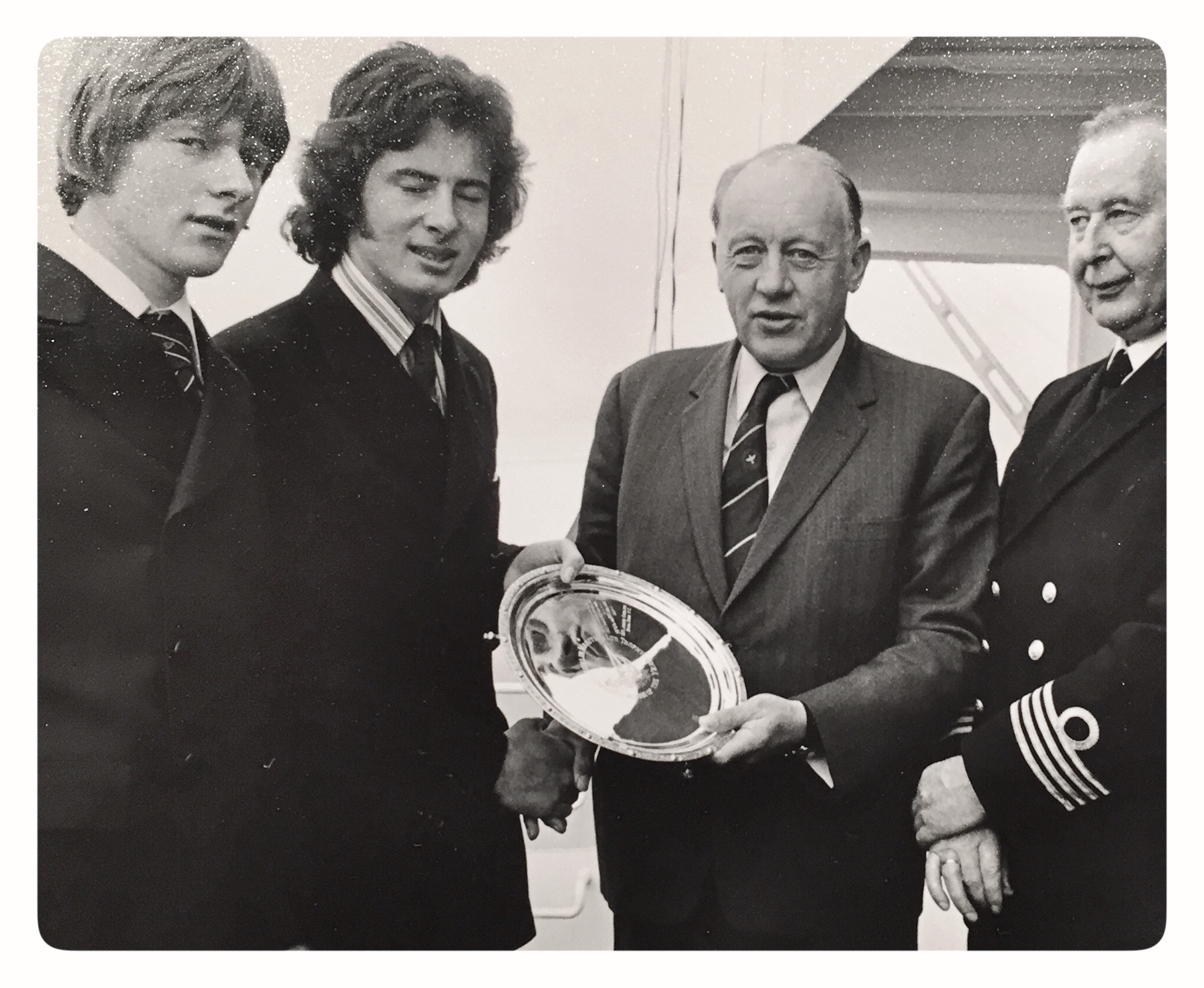 Patrick Jameson presentes Joe English with the ISA Junior Helmsman's Trophy in 1974 - Left to right: Nei Keneflick, Joe English, Patrick Jameson and the Captain of the RV Tyro, from which the trophy was presented each year in Dublin Port