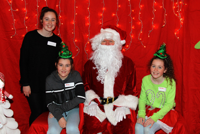 More of the Elves - Kate, Ella and Sarah with Santa