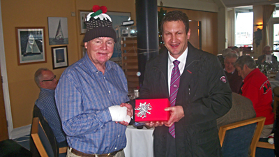 Gerry O"Neill receives a 'Christmas box' from Dean Fullston