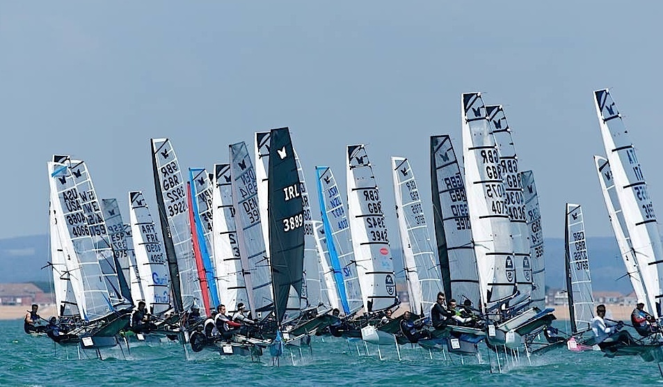 Alistair (black sail) competing at Hayling Island