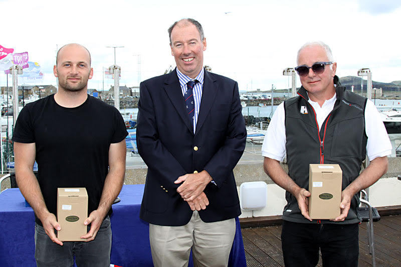 Gold Fleet winners - Nigel and Jack Grogan with Commodore Brian Turvey