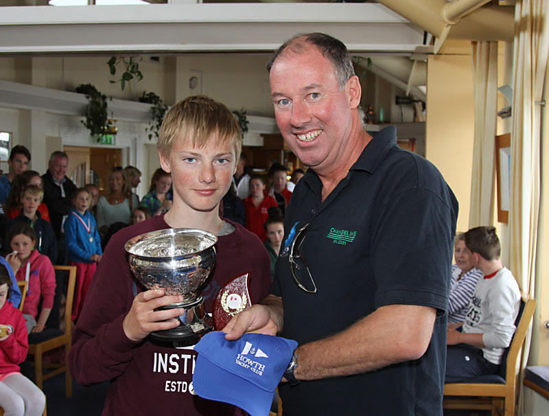 Laser 4.7 winner Daniel Hopkins with Commodore Brian Turvey