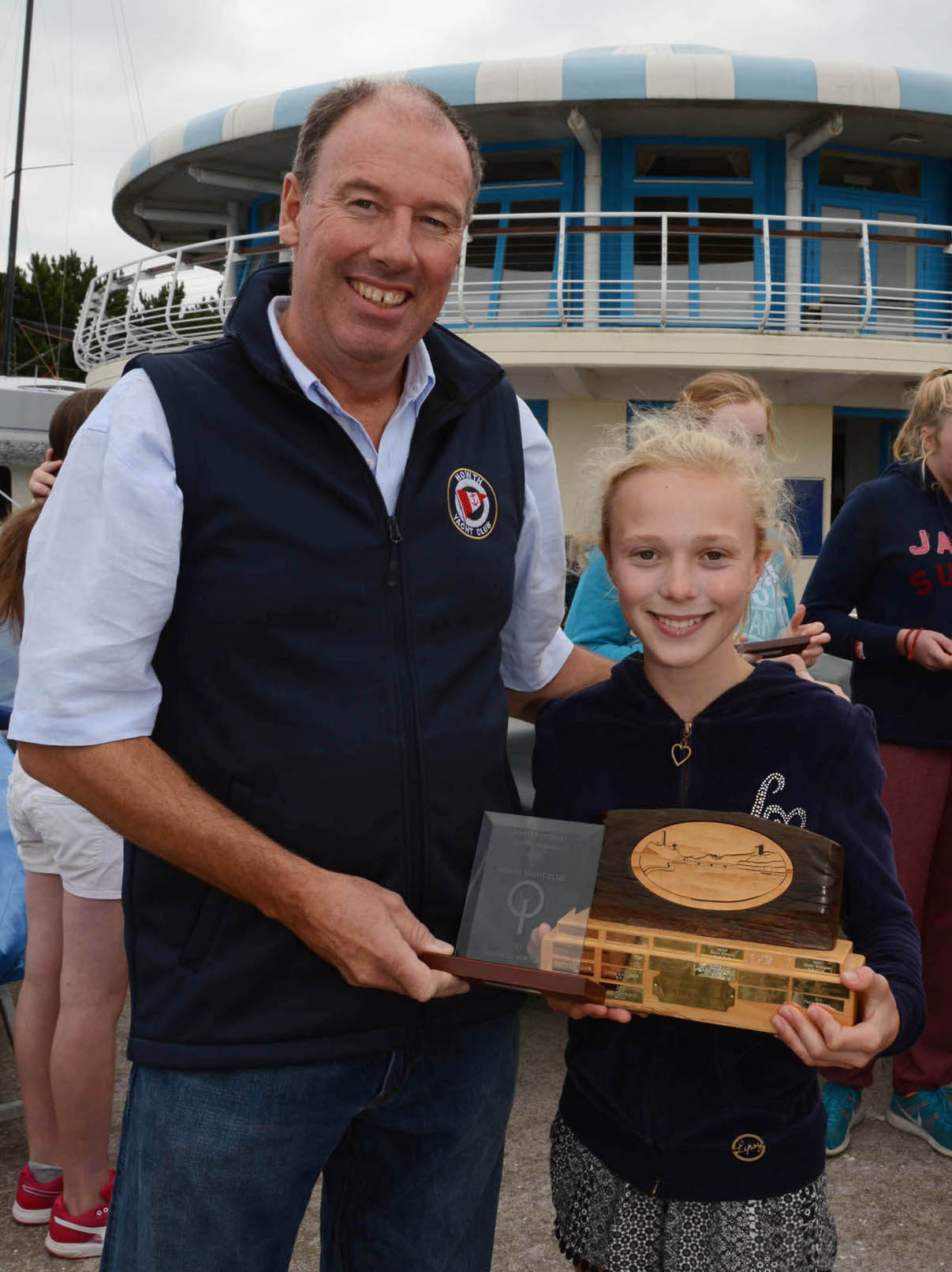 Emma Williams from the RSGYC with her prize for 1st in the Senior Silver Fleet