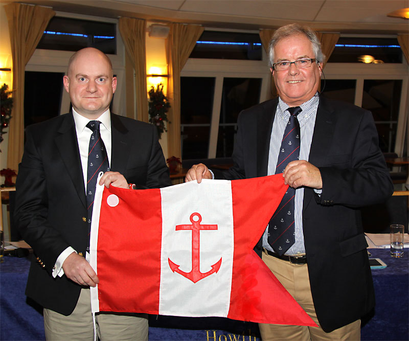 Emmet Dalton is presented with his Vice Commodore's burgee by Commodore Berchmans Gannon