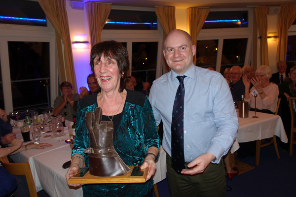 Sheila O'Reilly is presented the Ken Moles Trophy