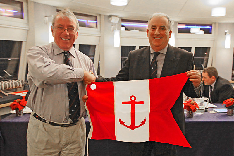 Ian Byrne receives his Vice Commodore's Flag from Commodore Joe McPeake