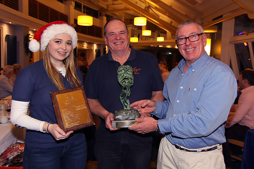 Jennie and Stephen Harris are presented with the Lorna Townsend Trophy by Commodore Ian Byrne
