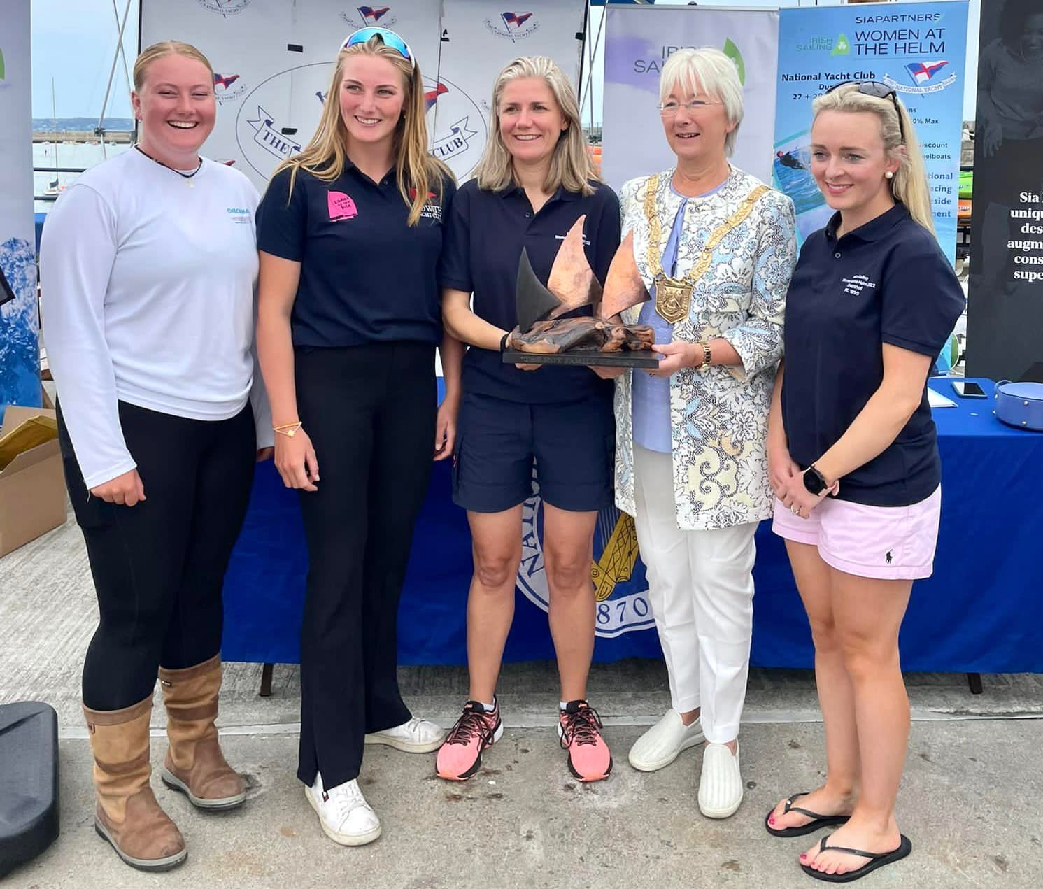 HYC Skippers Suzie Murphy, Aoife Hopkins, Laura Dillon, and Diana Kissane being presented with the Roy Family trophy