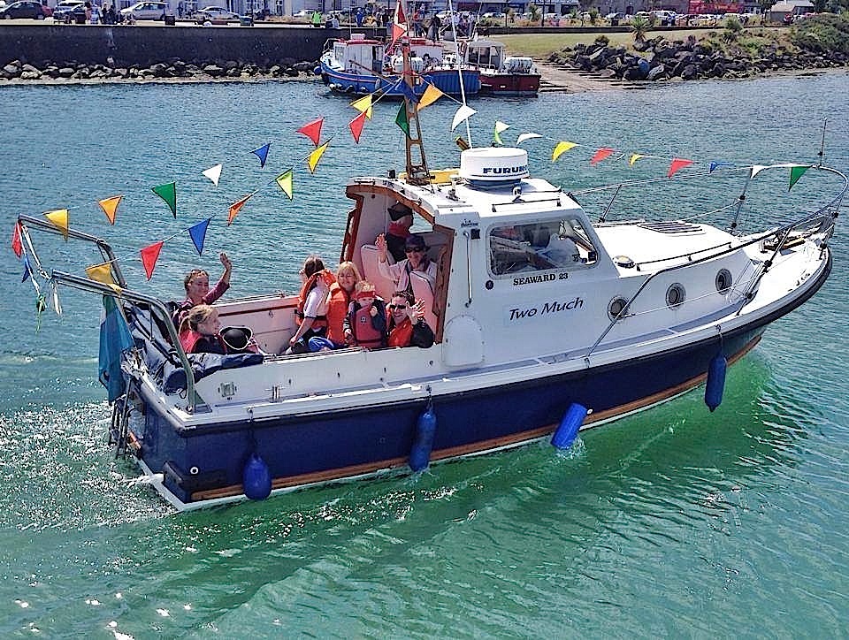 Neville and Jean Maguire return to the marina with their guests