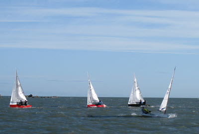 Dinghy Frostbites Revel in Glorious Sunshine and Superb Sailing Conditions