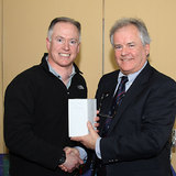 3rd in the Laser Standard Spring Series  Daragh Sheridan receives his award from Vice Commodore Berchmans Gannon 6328.jpg