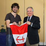 Event Organiser Ian McSweeney is presented with a club burgee by Vice Commodore Berchmans Gannon 6361.jpg