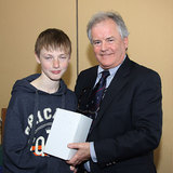 Daniel Hopkins collects his '4.7 Winter Series' prize from Vice Commodore Berchmans Gannon 6321.jpg