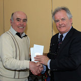 Joe Cull is presented with his prize as winner of the 'Grand Master' award by Vice Commodore Berchmans Gannon 6325.jpg 