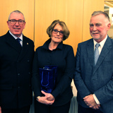Ian_Byrne_(Commodore)_and_John_Connolly_awarding_Geraldine_Corr_Third_prize_for_the_Photographic_Competition.jpg