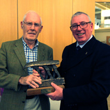 Cyril_Byrne_being_presented_the_Donal_Skehan_Trophy_by_Ian_Byrne.jpg